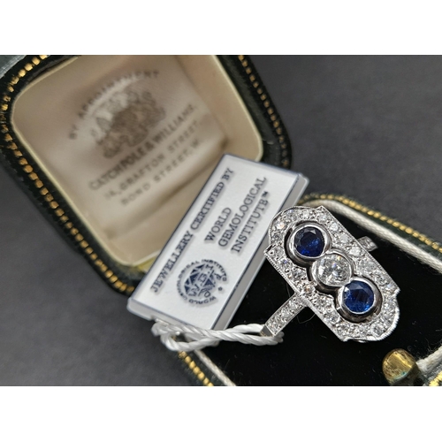 5 - A 950 Platinum Sapphire and Diamond W.G.I Certified Art Deco Ring. A platinum ring with 31 round bri... 