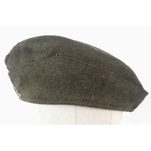 538 - Re-enactors WW2 German Army Side Cap. Looks very original as it has been in many re-enacting battles... 