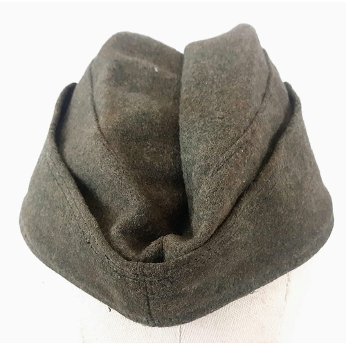 538 - Re-enactors WW2 German Army Side Cap. Looks very original as it has been in many re-enacting battles... 