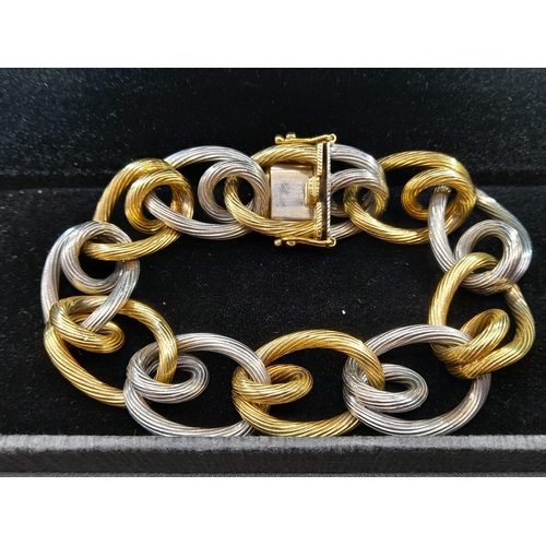 2 - A Very Unique 18K Yellow and White Gold W.G.I. Certified Bracelet. Barbed-wire effect links. 100.88g... 