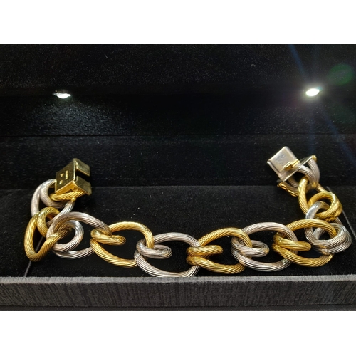 2 - A Very Unique 18K Yellow and White Gold W.G.I. Certified Bracelet. Barbed-wire effect links. 100.88g... 