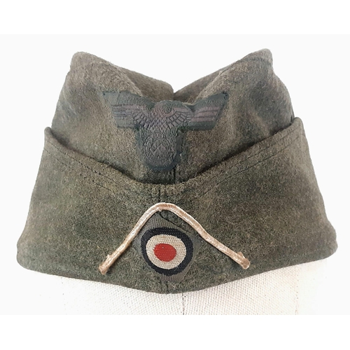 538 - Re-enactors WW2 German Army Side Cap. Looks very original as it has been in many re-enacting battles... 