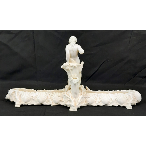 591 - Two Vintage Possibly Antique White Ceramic Figures. Both sit on a rock overlooking a wide channel - ... 