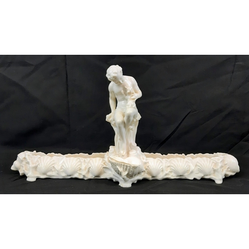 591 - Two Vintage Possibly Antique White Ceramic Figures. Both sit on a rock overlooking a wide channel - ... 