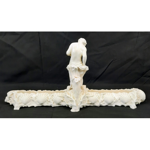 591 - Two Vintage Possibly Antique White Ceramic Figures. Both sit on a rock overlooking a wide channel - ... 