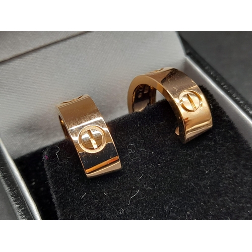 74 - A Pair of 18K Yellow Gold Cartier Clip Earrings. 8.6g total weight.