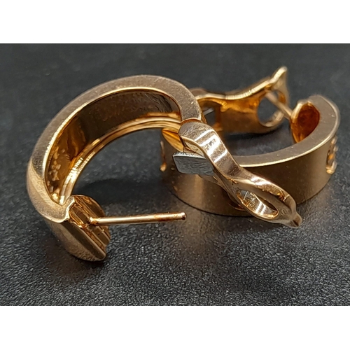 74 - A Pair of 18K Yellow Gold Cartier Clip Earrings. 8.6g total weight.