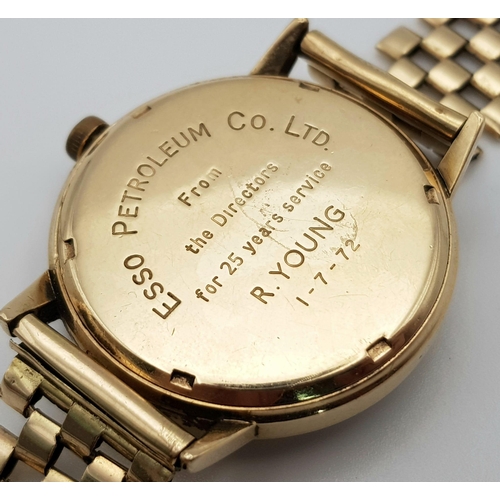 29 - A Vintage 9K Gold Garrard Eterna Watch. 9K gold strap and case - 35mm. Mechanical movement. Inscript... 