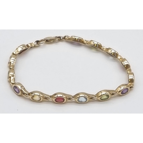 54 - A 14K Yellow Gold Multi-Coloured Gemstone Bracelet. Peridot, amethyst, garnet, citrine and topaz. 20... 