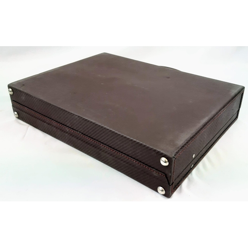 599 - A Simpson of London Carbon Brown Leather Attaché Case. Unused, but some small signs of shop wear and... 