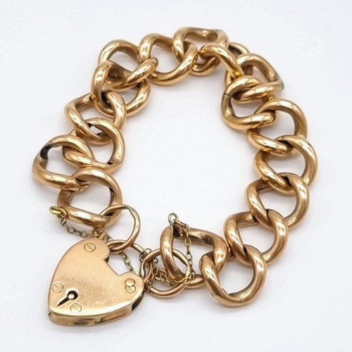 605 - A Vintage 9K Yellow Gold Curb Link Bracelet with Heart Clasp. 18cm. 29.21g