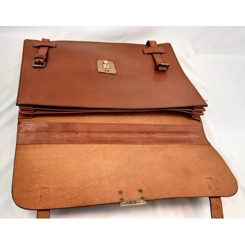 61 - A Simpson of London Flap-over Document Case in Dark Brown Leather. With original tag. Unused but som... 