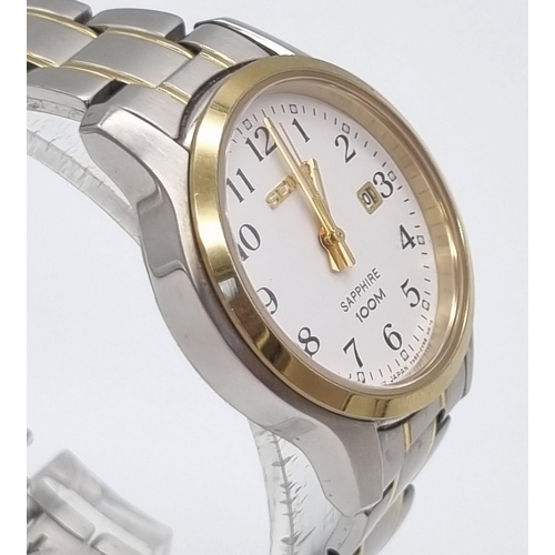 621 - A Seiko Sapphire Ladies Quartz Watch. Two tone strap and case - 28mm. White dial with date window. I... 