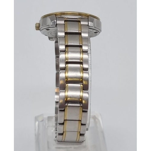 621 - A Seiko Sapphire Ladies Quartz Watch. Two tone strap and case - 28mm. White dial with date window. I... 