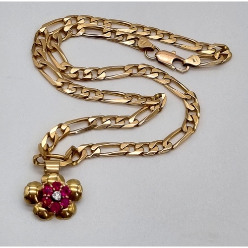 68 - A 9K Yellow Gold Figaro Link Chain with a 9K Yellow Gold Floral Pendant with Pink Sapphire and Diamo... 