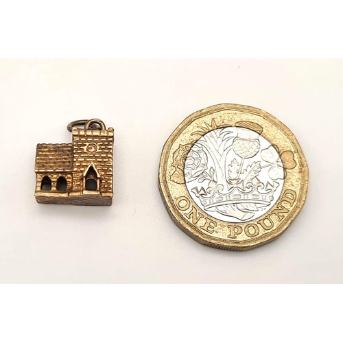 583 - 9K YELLOW GOLD CHURCH CHARM 2.5G