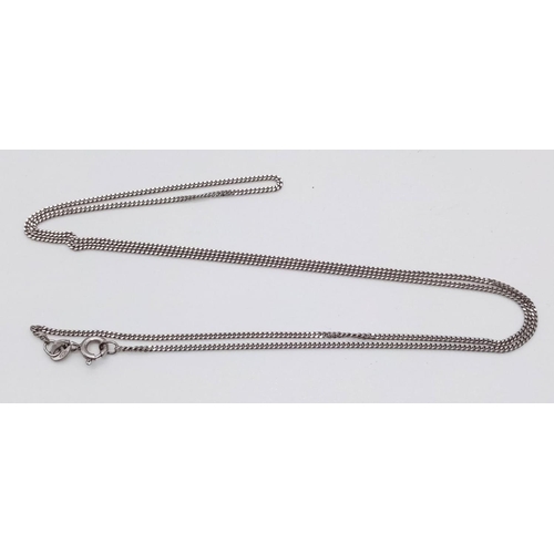 261 - 9K WHITE GOLD CURB CHAIN 2.4G 20