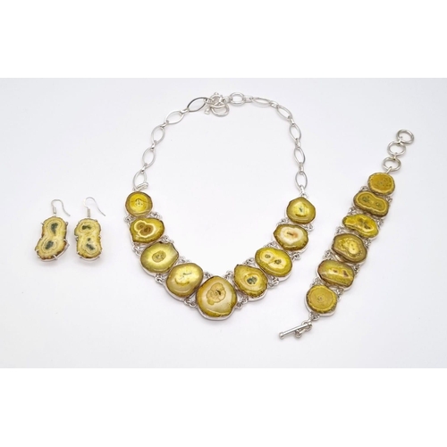 126 - A very unusual and unique, sterling silver, yellow solar quartz necklace, bracelet and earrings set.... 