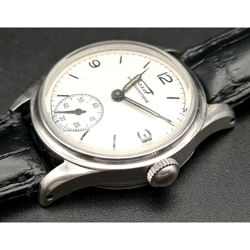 399 - A Vintage Tissot Antimagnetic Watch, Cal.27 movement. Black leather strap. Case - 30mm. White dial w... 