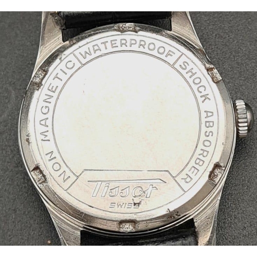 399 - A Vintage Tissot Antimagnetic Watch, Cal.27 movement. Black leather strap. Case - 30mm. White dial w... 