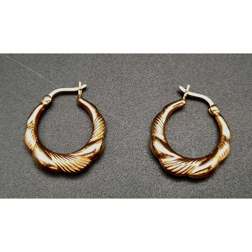 413 - A Pair of Vintage 9K Yellow Gold Hoop Earrings. 1.86g.