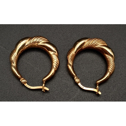 413 - A Pair of Vintage 9K Yellow Gold Hoop Earrings. 1.86g.