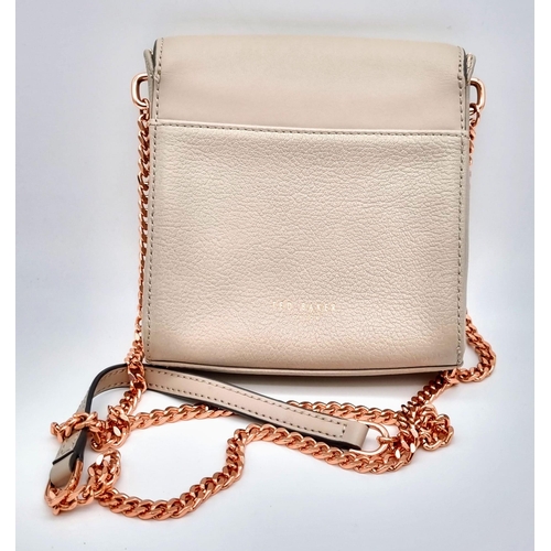 441 - A Ted Baker Leather Handbag. Rose gold plated hardware and strap. Very good condition but please see... 