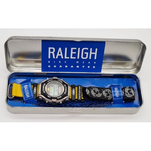 987 - A Raleigh Activator Digital Watch in Original Tin. In working order.