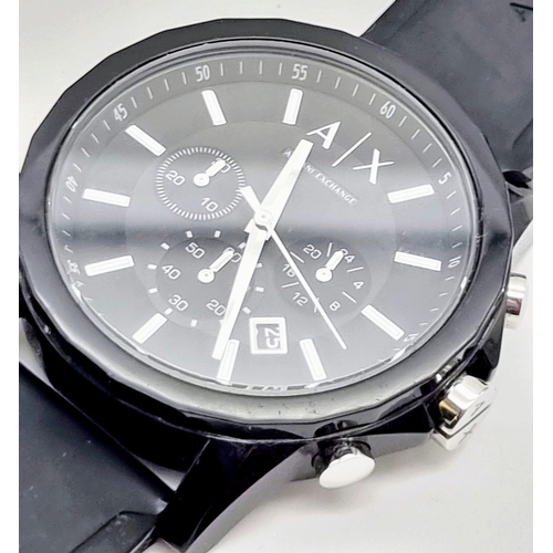 322 - An Armani Exchange Chronograph Gents Watch. Black rubber strap. Case - 44mm. Black dial with three s... 