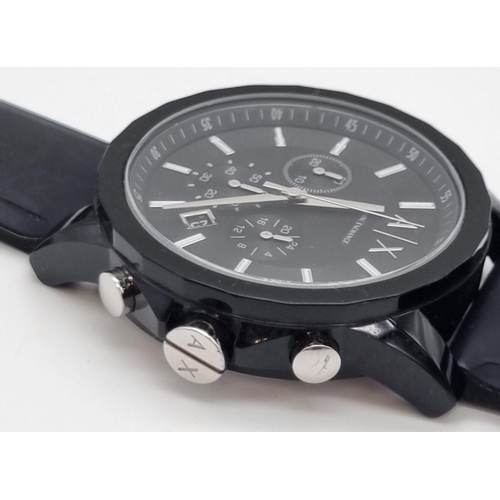 322 - An Armani Exchange Chronograph Gents Watch. Black rubber strap. Case - 44mm. Black dial with three s... 