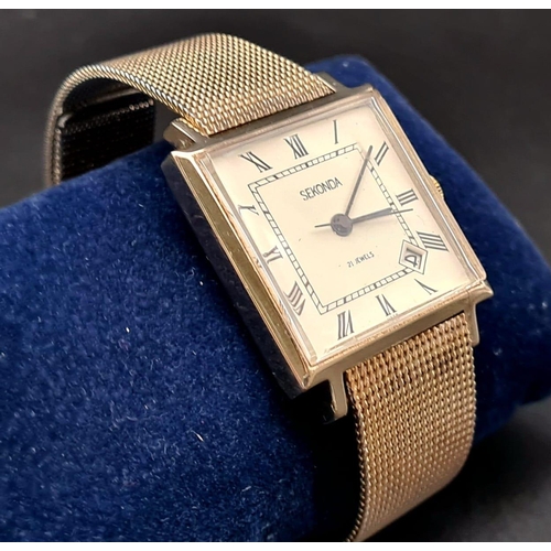 756 - A Vintage Sekonda Gents Watch. Stainless steel mesh strap. Square case - 28 x 28mm. White dial with ... 