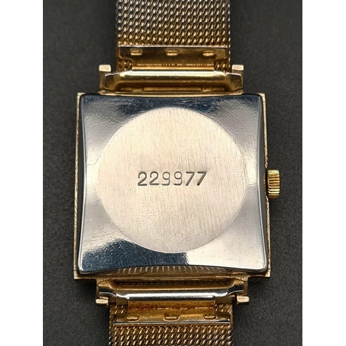 756 - A Vintage Sekonda Gents Watch. Stainless steel mesh strap. Square case - 28 x 28mm. White dial with ... 