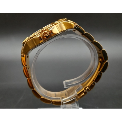 237 - A Police Gold Plated Watch. Gold plated strap and case - 38mm. White stone decorated bezel. White an... 