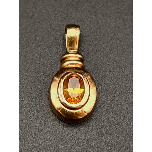 469 - A Pair of 9K Yellow Gold Citrine Stud Earrings and Pendant Set. One of the earrings is missing its b... 