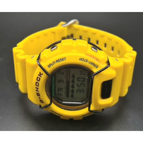 385 - A Yellow G-Shock Digital Watch. Yellow rubber strap and case - 45mm. In working order.