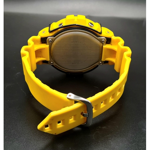 385 - A Yellow G-Shock Digital Watch. Yellow rubber strap and case - 45mm. In working order.