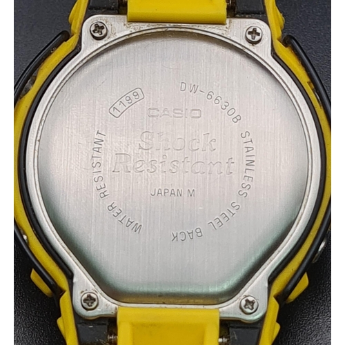 385 - A Yellow G-Shock Digital Watch. Yellow rubber strap and case - 45mm. In working order.