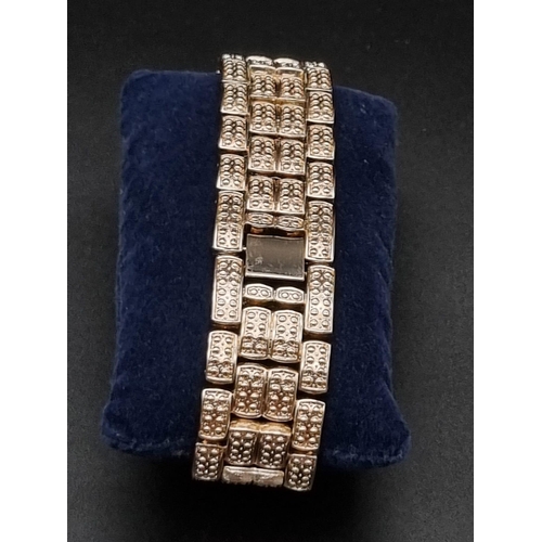 406 - A Techno Bling Watch. Gold plate and white stones throughout. Case - 45mm. In very good condition an... 