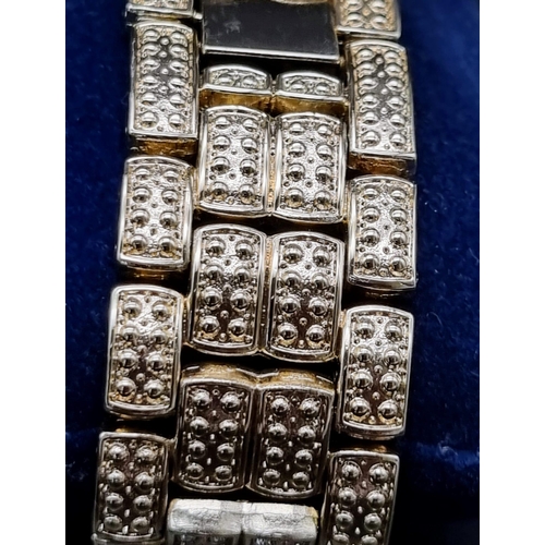 406 - A Techno Bling Watch. Gold plate and white stones throughout. Case - 45mm. In very good condition an... 