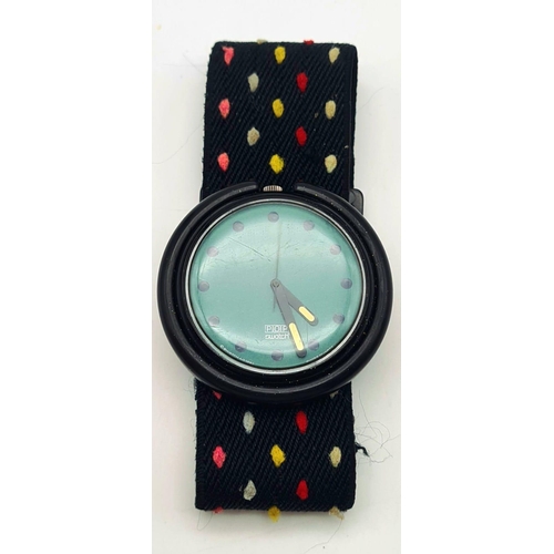 462 - A Collectable Swatch Pop Watch. Multi-coloured cloth strap. Blue dial. Case -45mm. Quartz movement i... 