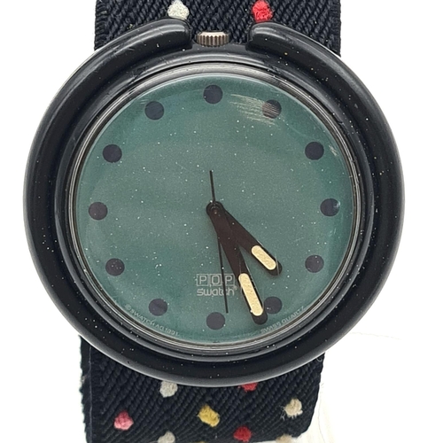 462 - A Collectable Swatch Pop Watch. Multi-coloured cloth strap. Blue dial. Case -45mm. Quartz movement i... 