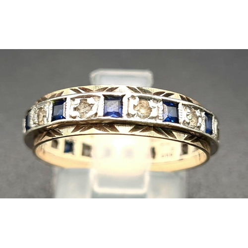 525 - A 9K Yellow/White Gold Blue and White Stone Eternity Ring. Size P. 3.14g total weight.