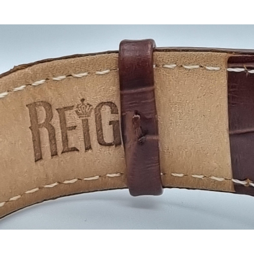 21 - A Reign Chronograph Automatic Gents Watch. Brown leather strap. Rose gold coloured case - 48mm. Skel... 