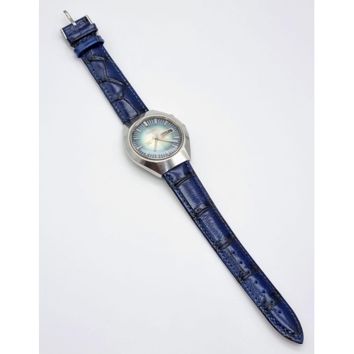 230 - A Rare Vintage Ricoh (Seiko) Gents Watch. Blue leather strap. Stainless steel case - 40mm. Blue dial... 