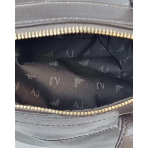 343 - A Large Armani (Jeans) Handbag. Brown leather with monogrammed cloth interior. In good condition (wi... 