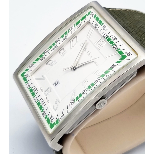 392 - A Calvin Klein Jeans Large Faced Watch. Green cloth strap. Stainless steel case - 50 x 42mm. White d... 