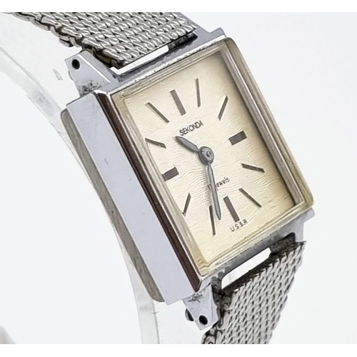 902 - A Vintage Sekonda Quartz Ladies Watch. Stainless steel mesh strap. Square case - 20 x 20mm. In origi... 