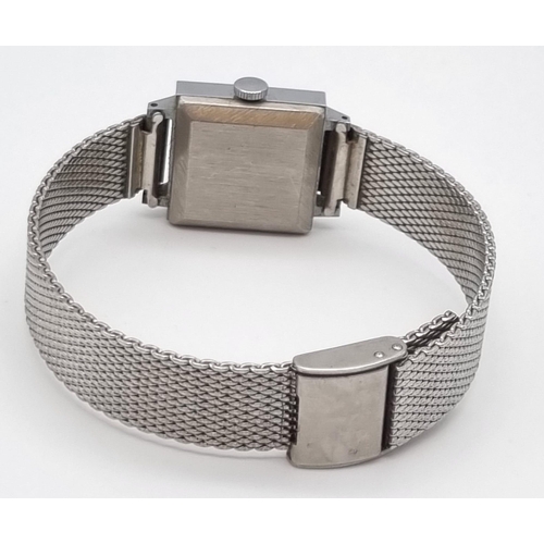 902 - A Vintage Sekonda Quartz Ladies Watch. Stainless steel mesh strap. Square case - 20 x 20mm. In origi... 