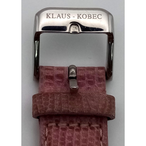 308 - A Klaus Kobec Ladies Chronograph Watch. Leather strap. Case - 33mm. Pink dial with three sub dials. ... 