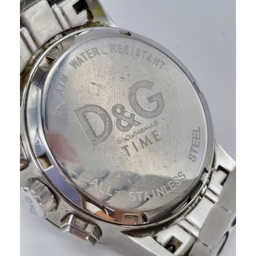 931 - Gentlemans Quartz D&G Chronograph, Multi dial black face model having sweeping red second hand. Silv... 